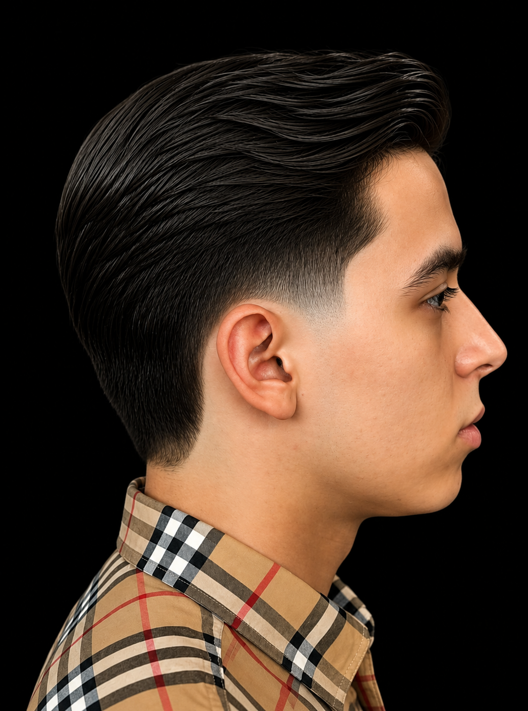 Back view of a fresh low taper fade with a textured top